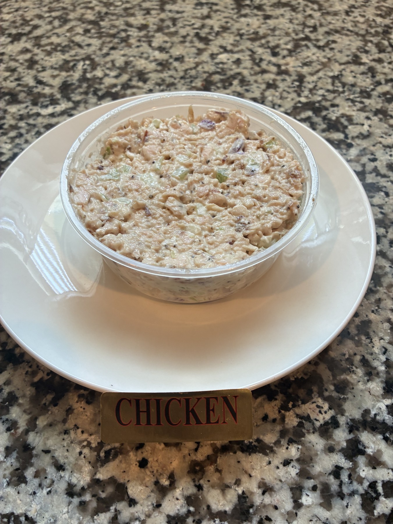 Stuff N Smoke smoked chicken salad plated with lid off